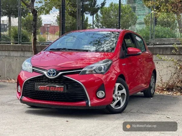 Foto 1/8: Tirane, shes makine TOYOTA YARIS HYBRID 2016 Benzin, e kuqe automatik Klima 135.000 km në Tiranë | NjoftimeFalas.vip